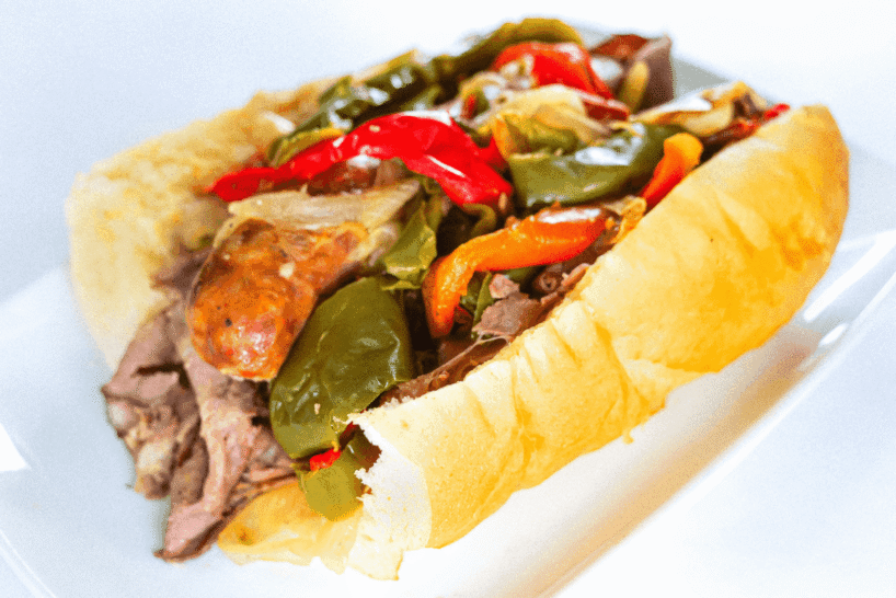 Italian sausage sandwich with grilled peppers and onions.