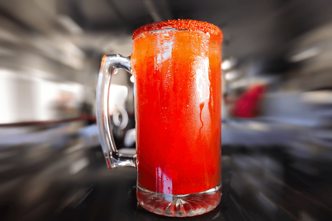 Chili-rimmed tomato cocktail in frosty mug